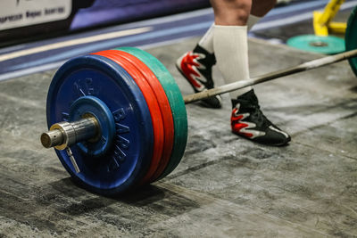 Low section of man exercising in gym