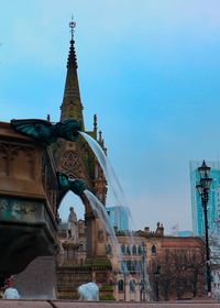Low angle view of buildings against sky