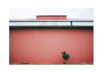 Red building against sky