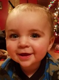 Close-up portrait of smiling boy