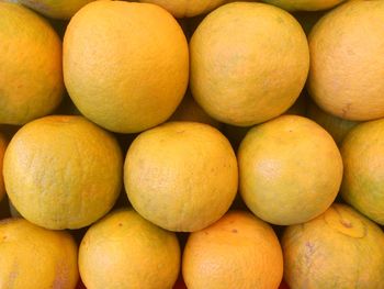 Full frame shot of sweet limes for sale at market stall