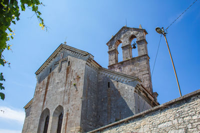 Low angle view of historic building against sky