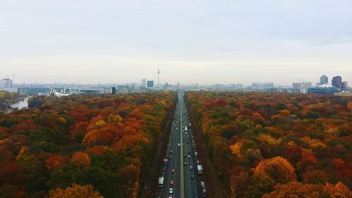 High angle view of highway by autumn trees