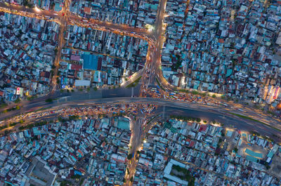 Aerial view of illuminated city buildings