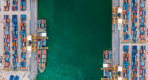 Aerial view from drone logistics and transportation of container cargo ship and cargo import export 
