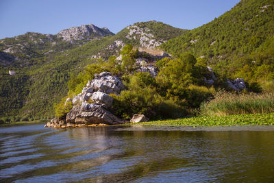 Scenic view of lake and mountains