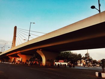 Bridge against clear sky during sunset