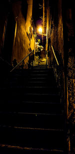 Low angle view of illuminated staircase in building