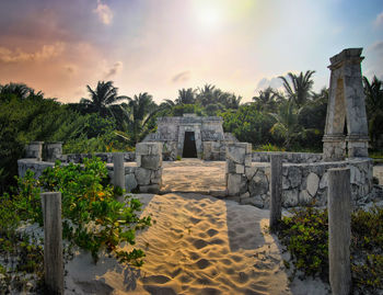 Ruins of building against cloudy sky