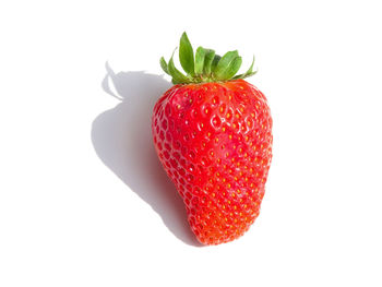 Close-up of strawberry against white background