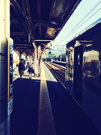 People at railroad station