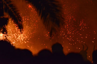 Firework display at night