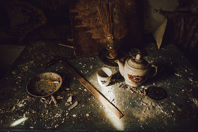 High angle view of old objects on table at home