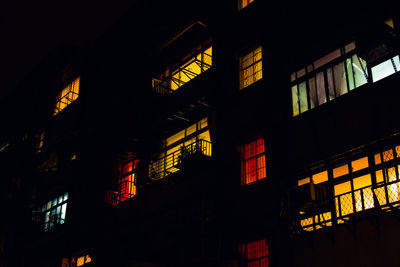 Low angle view of illuminated street at night