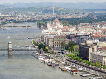 High angle view of river amidst buildings in city