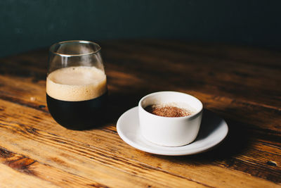 Close-up of beer and dessert on table