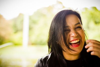 Portrait of smiling mid adult woman