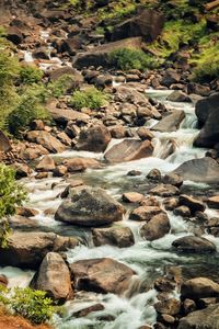 Scenic view of pebbles in water