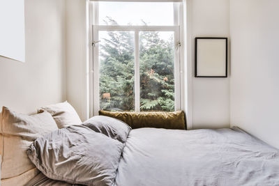 White curtain on bed at home