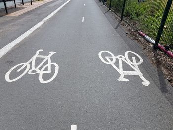 High angle view of bicycle lane marking on road 