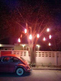 Illuminated street light at night