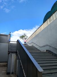 Low angle view of building against blue sky