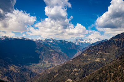 Himalaya mountain valley with bright blue sky at day from hilltop