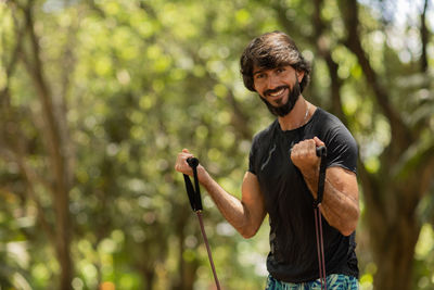 Man running and jogging at a park outdoors. male person workout. feel good, healthy concept. 