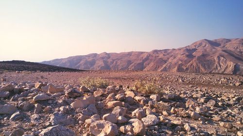 Panoramic view of mountains against clear sky