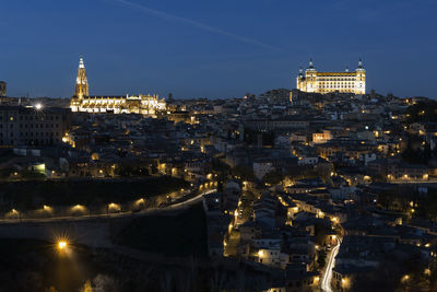 High angle view of illuminated city at night