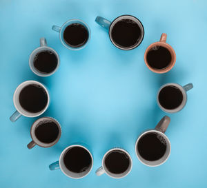 High angle view of coffee cups on table