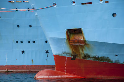 Close-up of ship moored at harbor