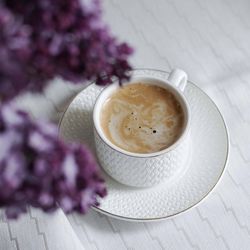 Close-up of coffee served on table