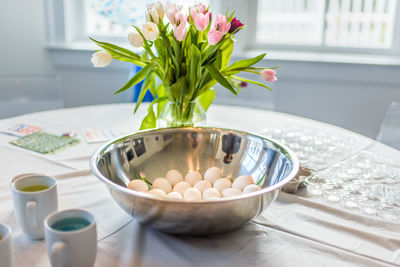 Close-up of vase on table at home