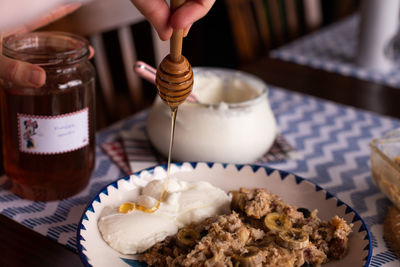 Midsection of person preparing food