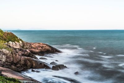 Scenic view of sea against clear sky