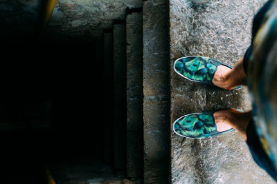 High angle view of man standing on steps