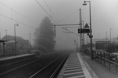 Railroad tracks against clear sky