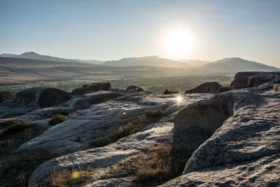 Scenic view of landscape against sky during sunset