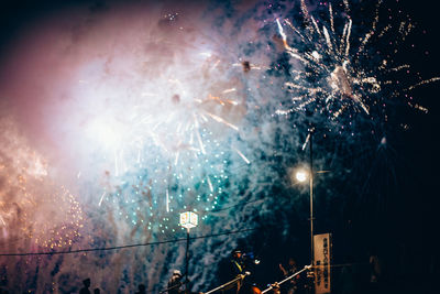 Firework display at night