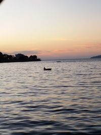 View of calm sea at sunset