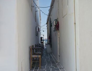 Narrow alley amidst buildings in city