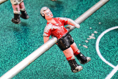 Close-up of figurine at foosball