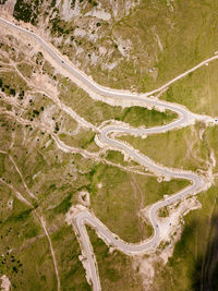 Winding and dangerous road from the high mountain pass in transalpina, romania