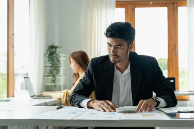 Businesswoman working in office