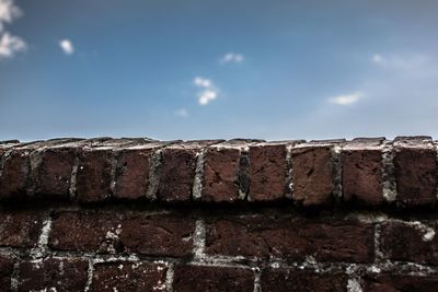 Low angle view of brick wall