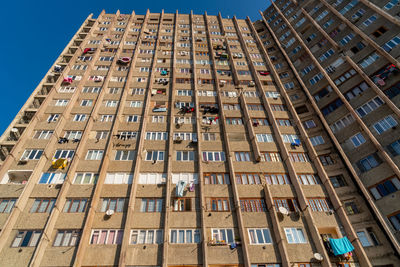 Low angle view of buildings against clear sky