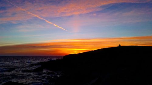 Scenic view of sunset over sea