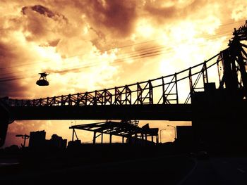 Train against cloudy sky at sunset