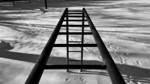 Low angle view of ladder against sky